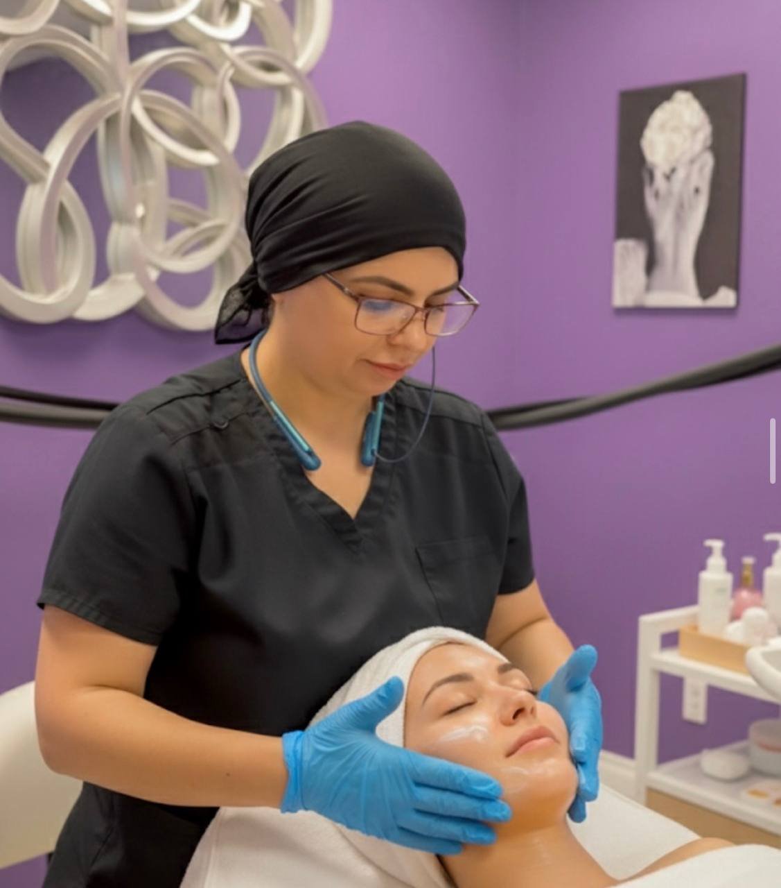HydraFacial facial treatment with cream mask applied by certified esthetician at American Laser Plus